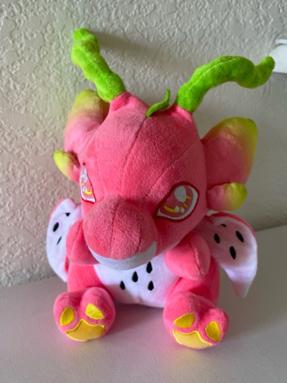 Pink dragon plush